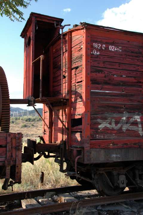 Rear of red wooden caboose