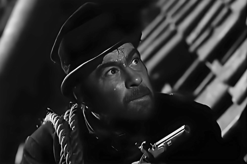 John Howard Davies in the scene