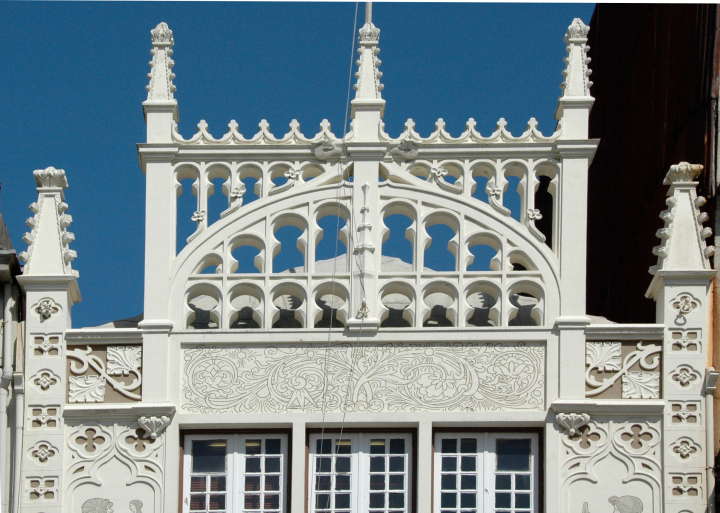 Detail of upper façade, Livraria Chardron, 144 Rua das Carmelitas, Porto, Portugal